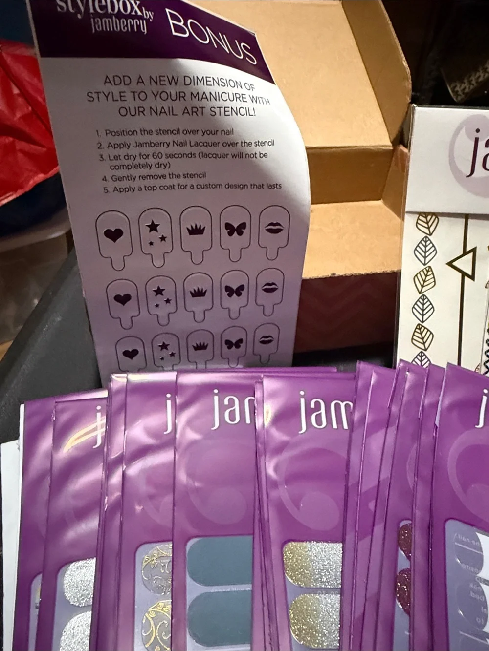 Jamberry Nail Wraps Assorted Styles in Purple Packaging